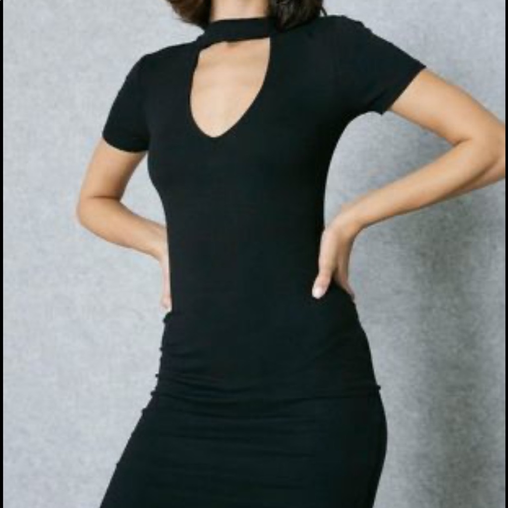 Slim black choker dress.